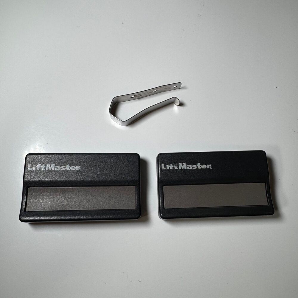 LiftMaster Garage Door Opener Remotes 1-Button Visor Control Clip OEM Lot of 2